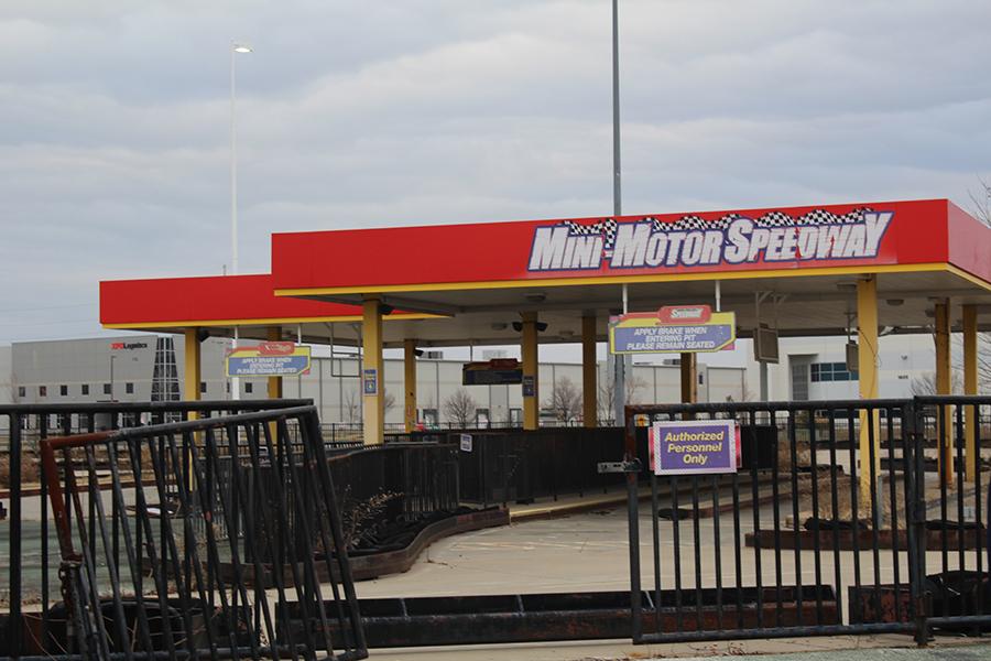 The former NASCAR Speedpark at the St. Louis Outlet Mall. The gate, previously keeping trespassers out, has long been busted open.