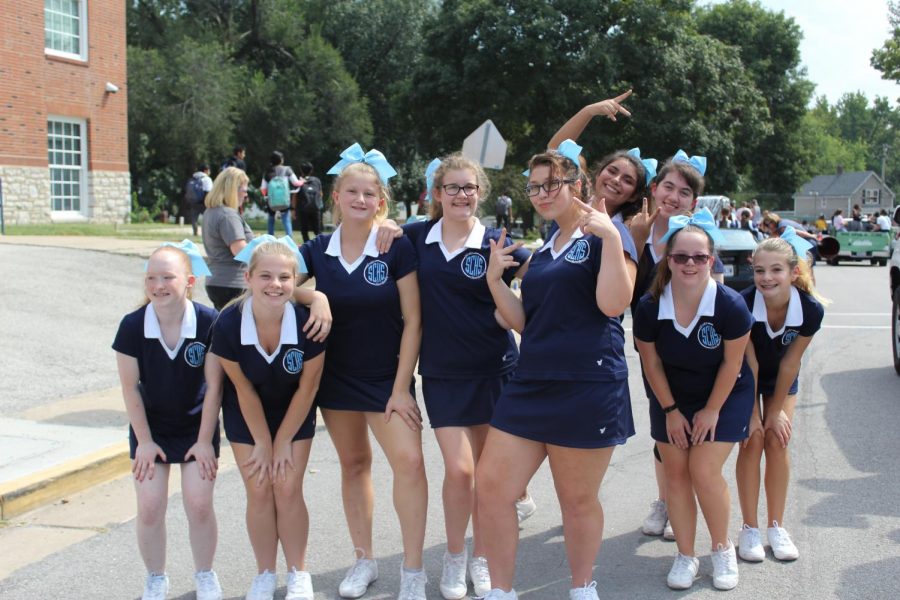 The cheerleaders await the start of the 2019 homecoming parade.