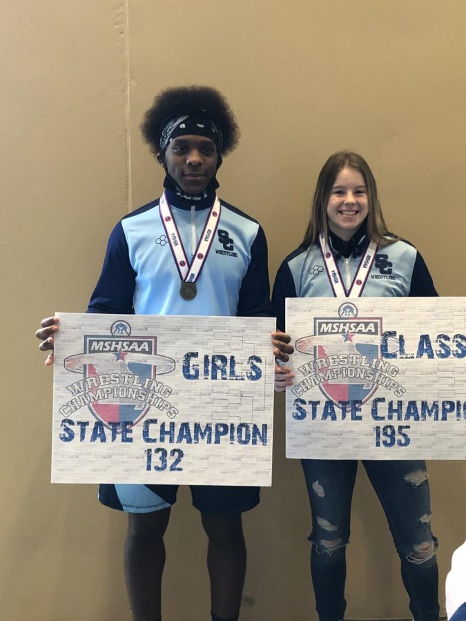 Seniors and Wrestling State Champions Trey Ward and Sabrina King celebrate their victories together