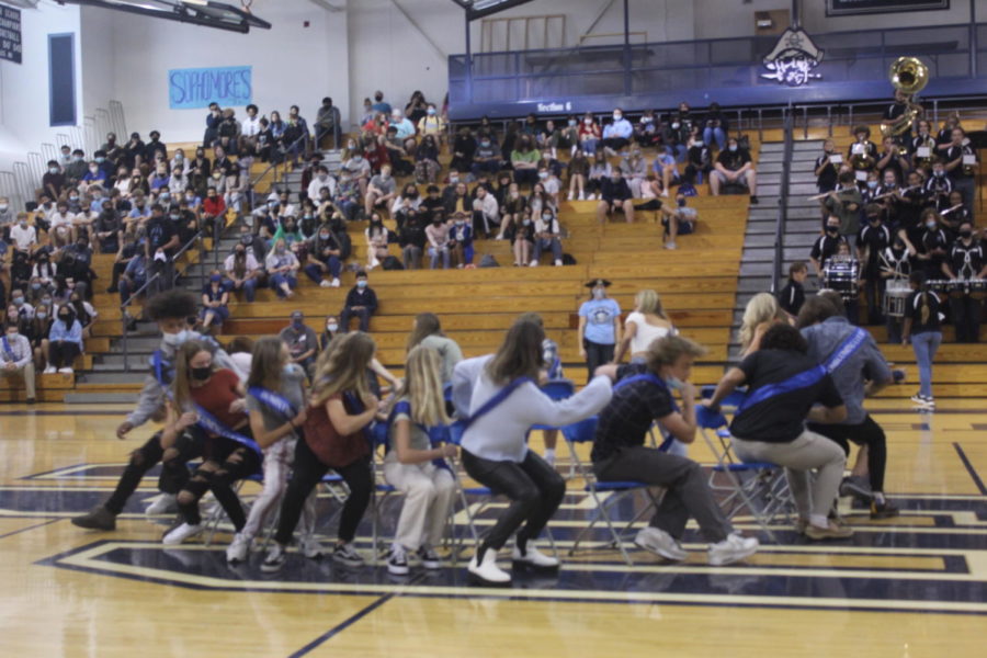 Homecoming court plays musical chairs.