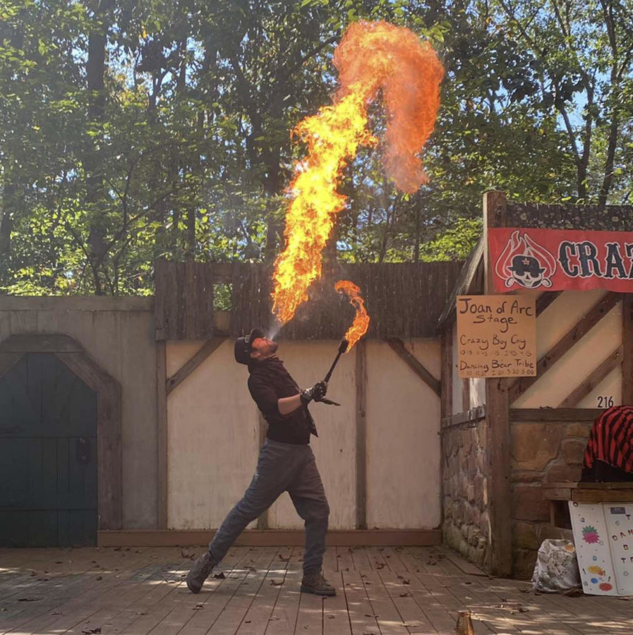 Pyro breathes fire to amaze the crowd at the STL Renaissance Faire.