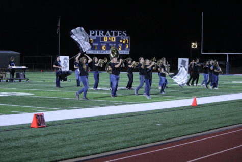 The marching band preforms at halftime on Sept 24.