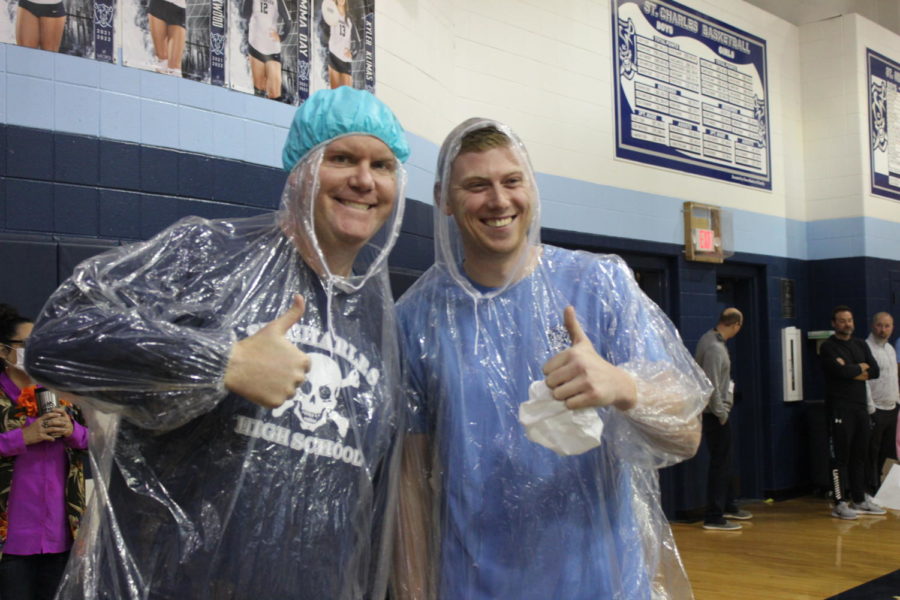 Mr. Hippe and Mr. Holtgraewe giving a thumbs up to the crowd.