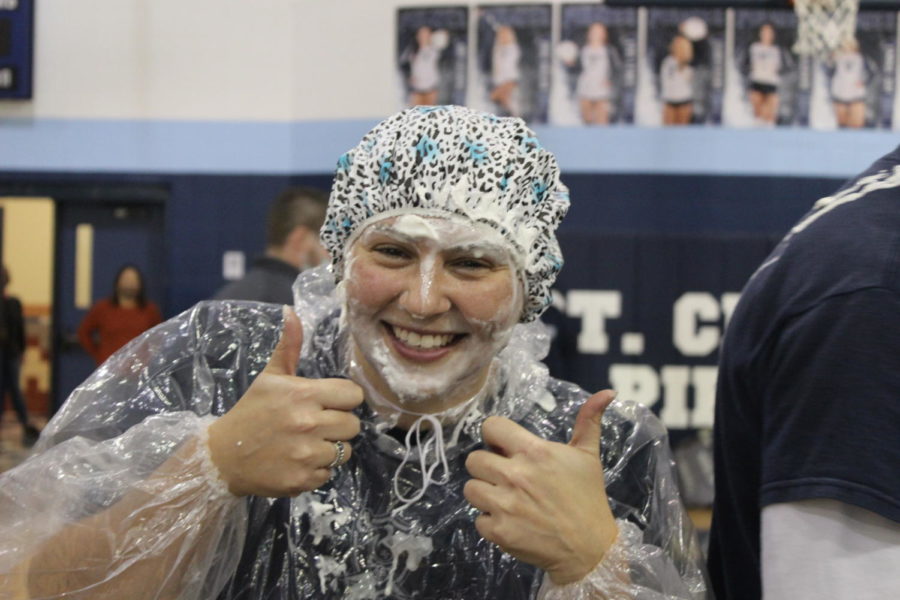 Ms. Laley covered in pie gave a thumbs up.