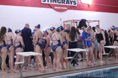 The team regroups at a meet against SCW on December 13.