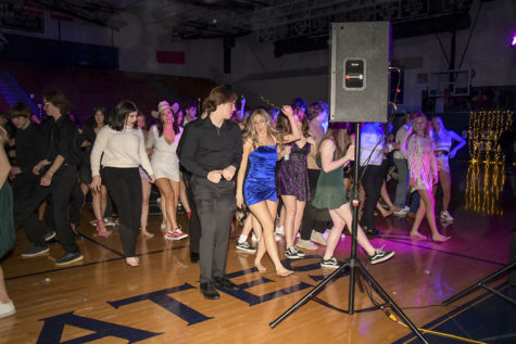Students at the Winter INformal kick to the Cupid Shuffle.
