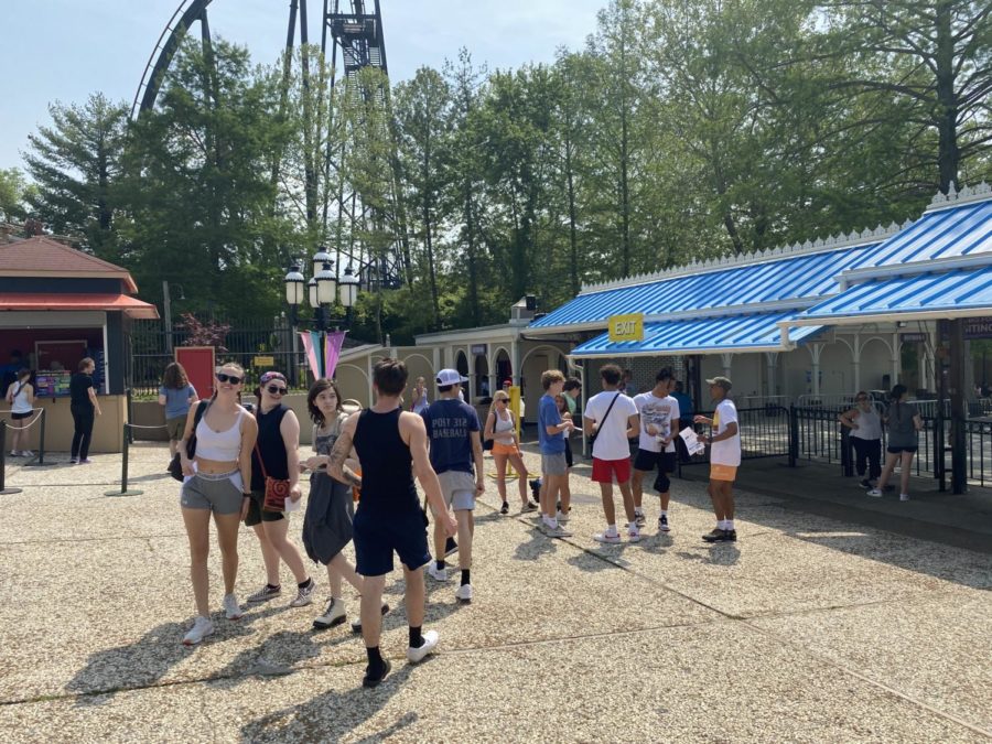 Students walking around the entrance of the amusement park