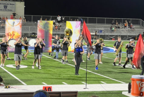 The marching band plays at halftime on Aug 26.