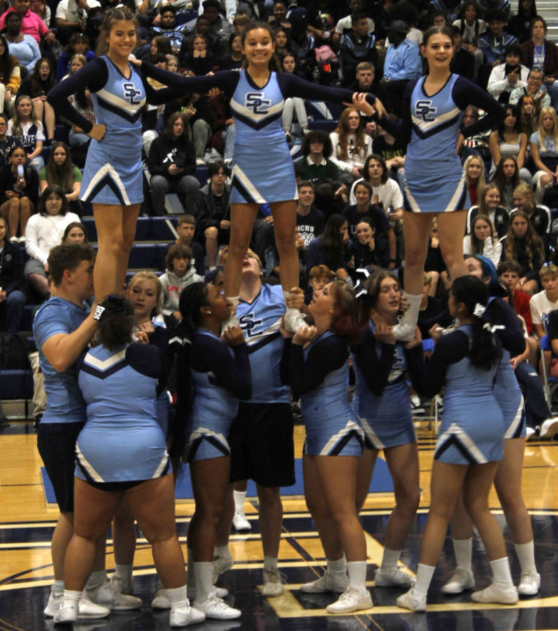 Cheer performs at their Homecoming assembly 
