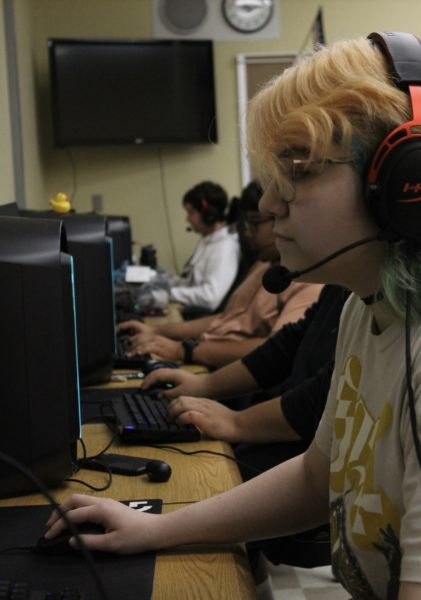 Players of the eSports team practicing their Overwatch skills amongst each other.