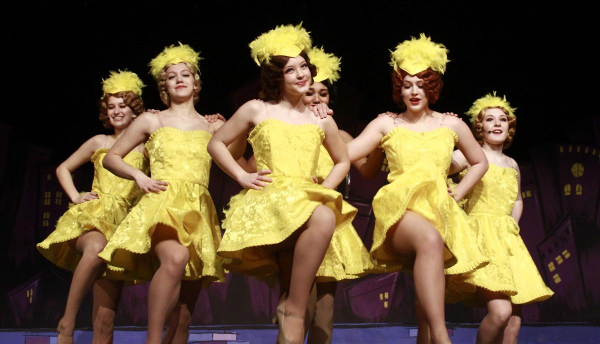 The Hot Box Girls dance during “A Bushel and a Peck.”