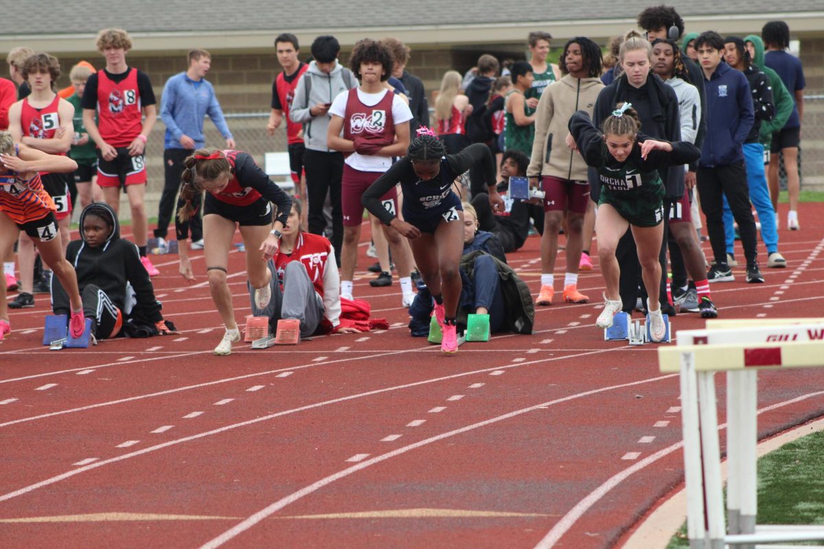 Teriyah Long launching out of the blocks for the 100 meter dash