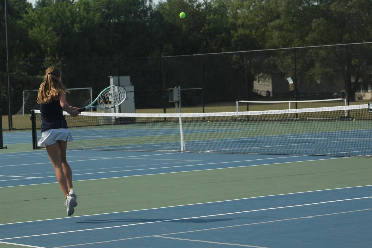 Matalyn Basler hits a backhand at practice 