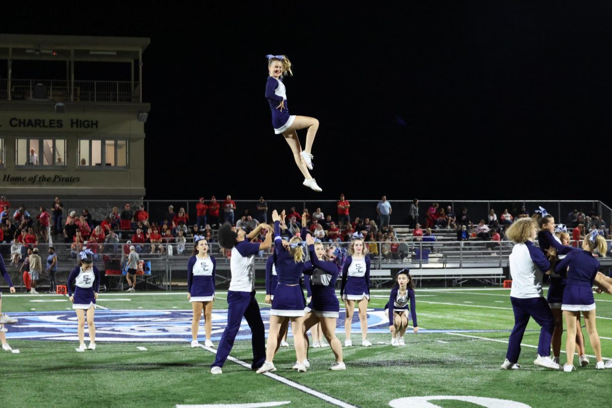 Cheer performance at the Homecoming Football Game