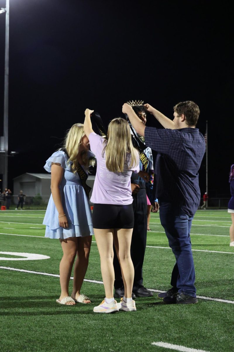 Homecoming king and queen being crowned