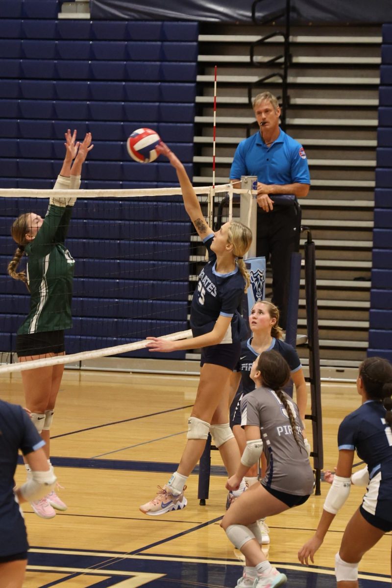 Lauren Miller spiking, Sept 10. against Whitfield