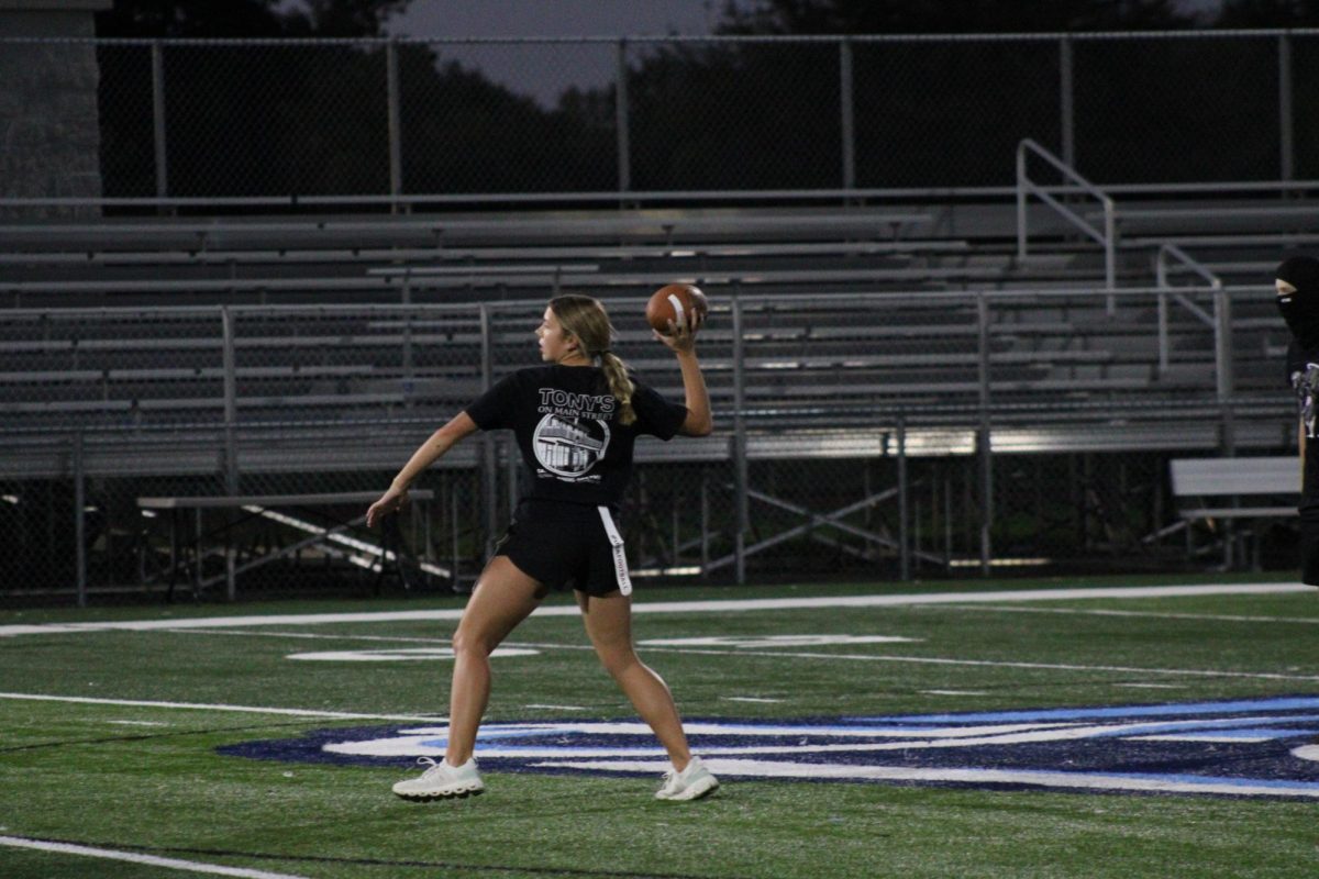 Addie Tubbs throwing a pass during PowderPuff