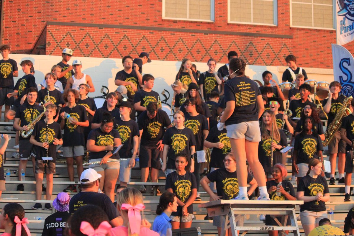 Colleen Ney getting ready to conduct the band.