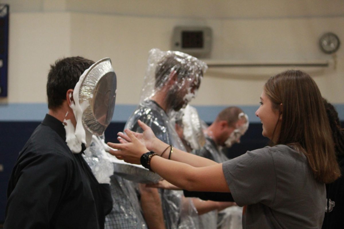 Mr. Messina after being pied in the face during assembly 