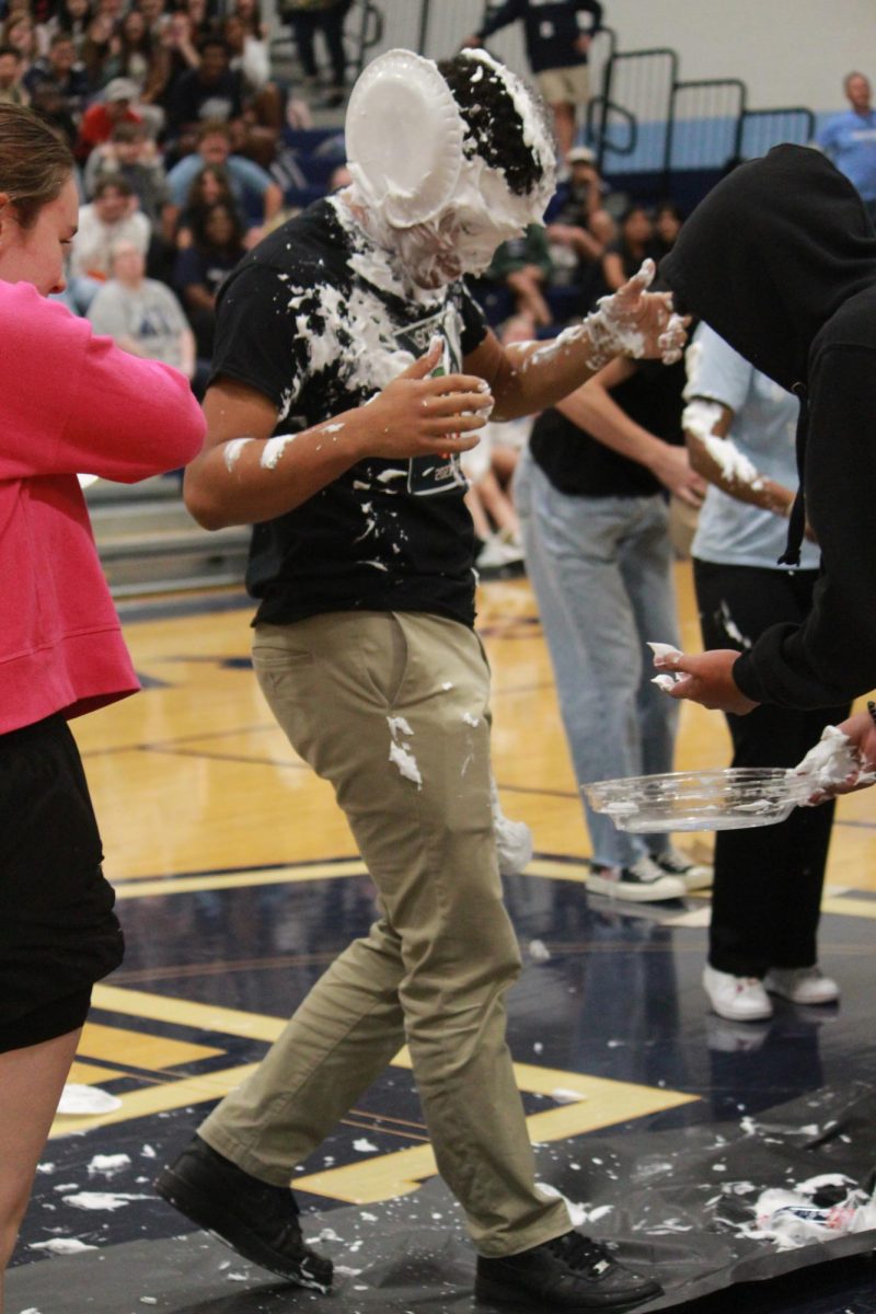 Staff after getting pied during assembly 