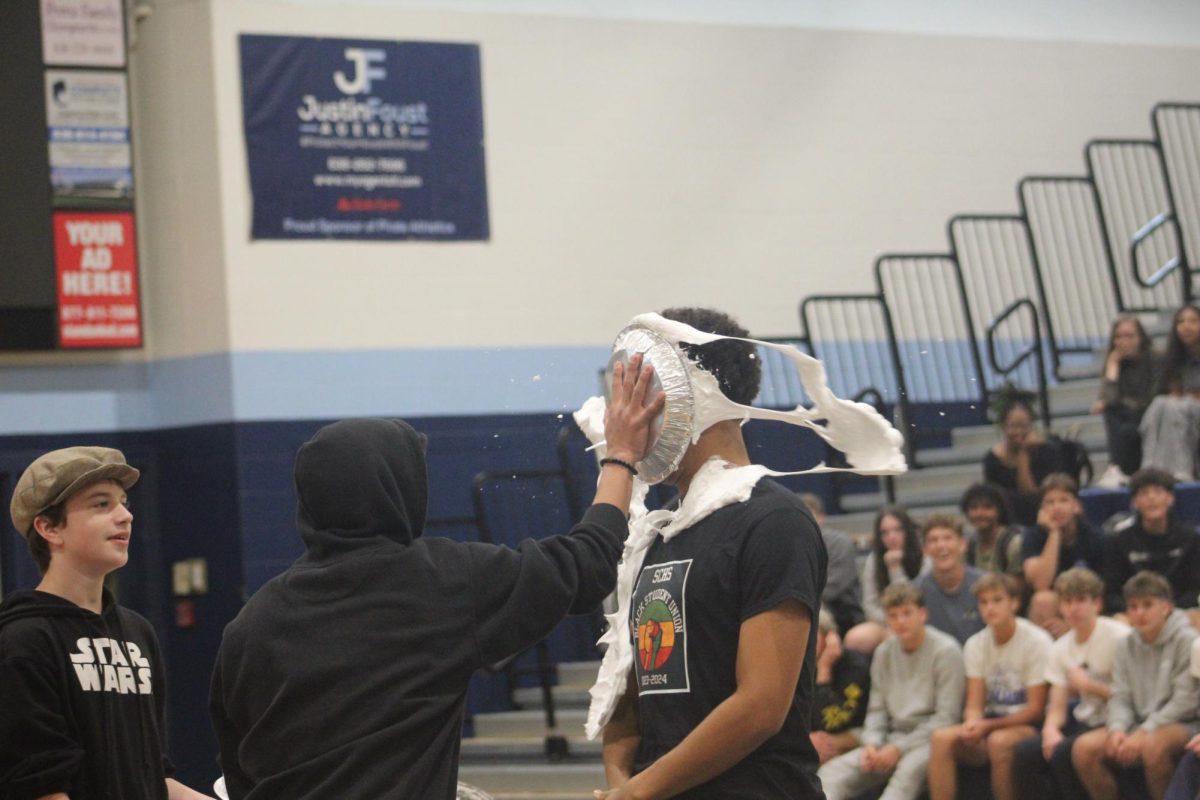 Mr. Mcelwee getting pied in the face at the Homecoming assembly 