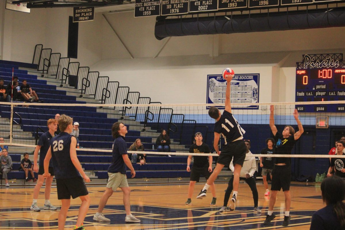 Noah Nordman spiking the ball during PowderBuff