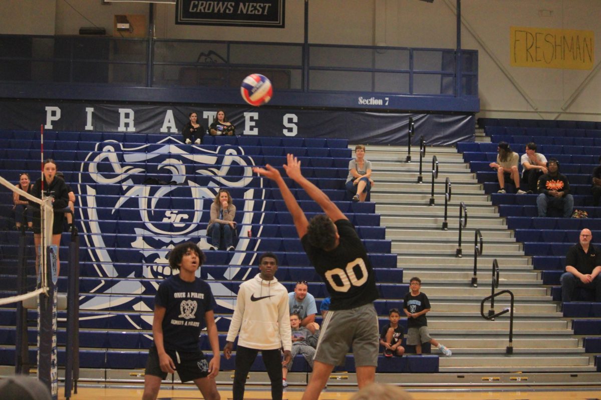 Zeek Lopez setting the ball during PowderBuff