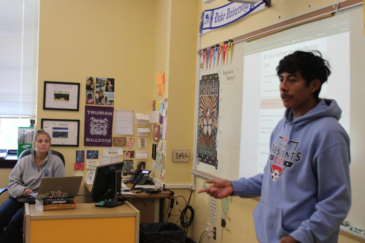 Chris Cortez Lopez speaks on the information about a group registration for an event happening in key club