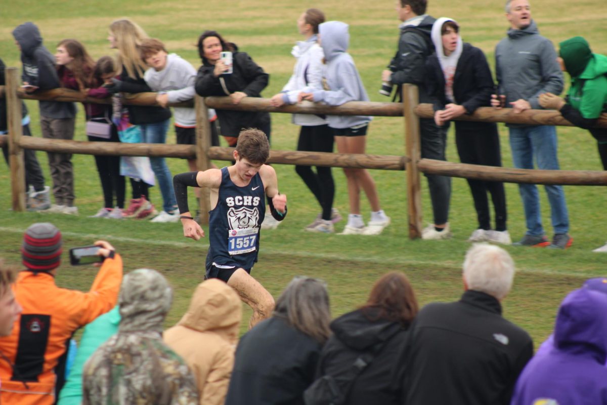 Elijah Case running during the state meet 