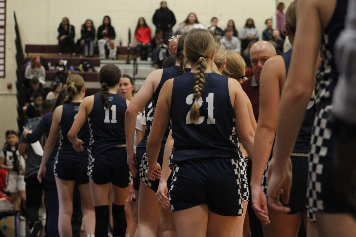 Avery Schneider shaking hands after the game 