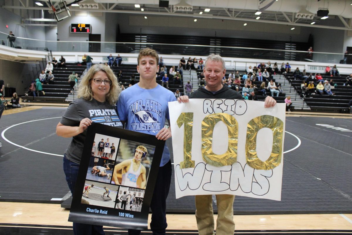 Charlie Reid with Parents after 100th win