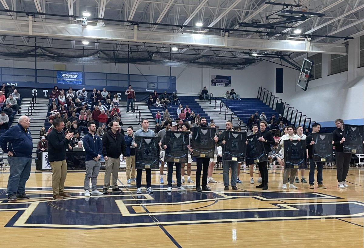 2015 boys varsity basketball team honored for state championship win