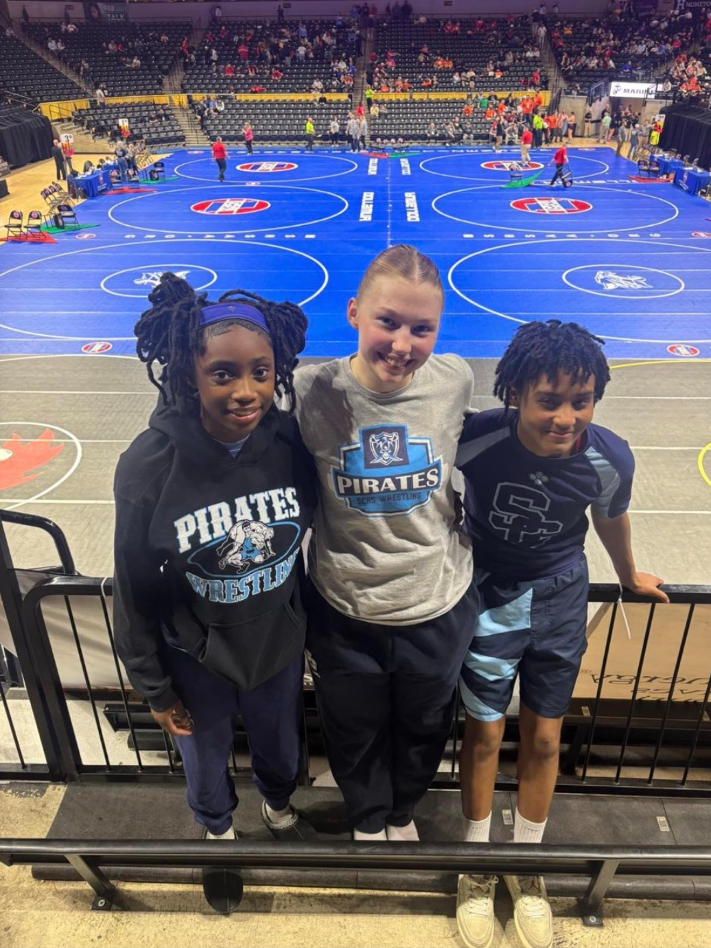 Cecile, Violet, and Brooklyn after a match