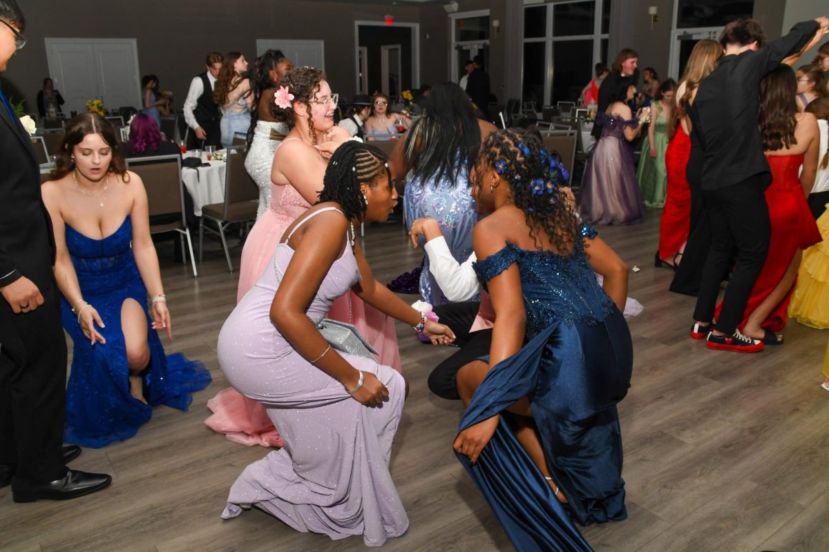 Samaria Martin-Pope dancing with friends at prom.