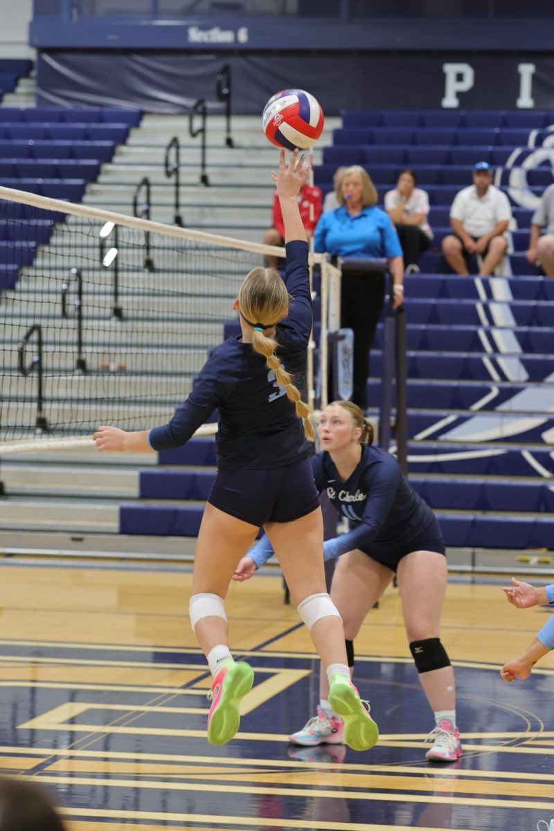 Rosie Kuegele tipping the ball 