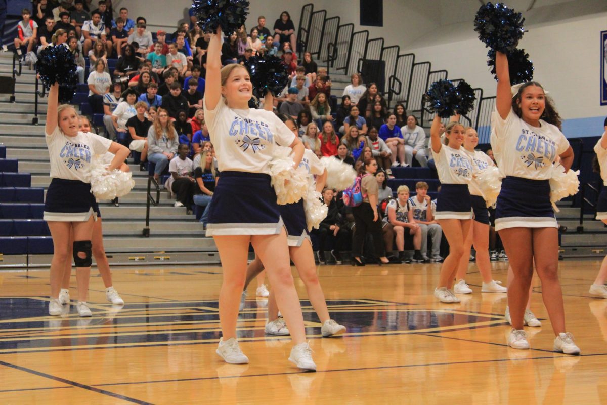 Cheer begins their first performance of the year