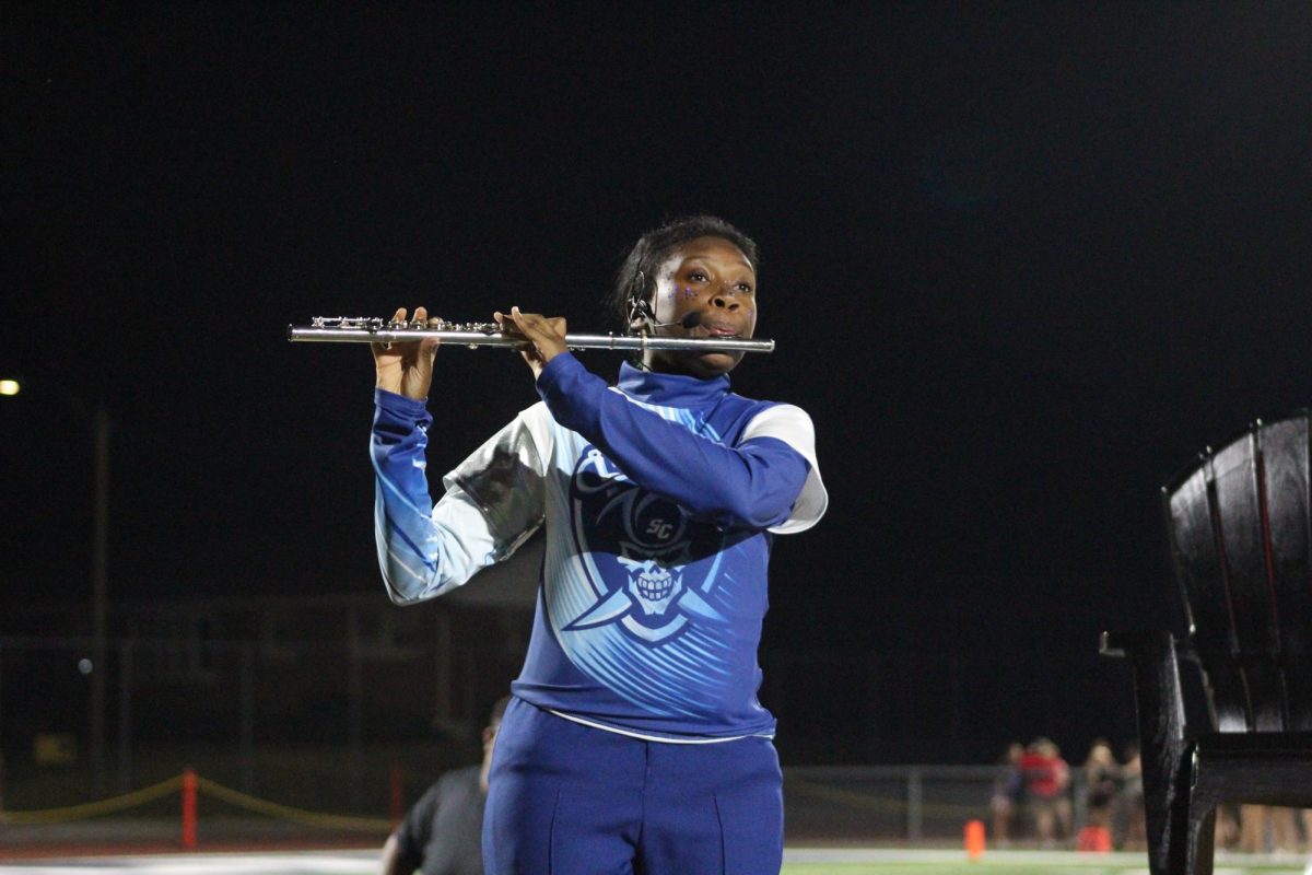 Kenzie Crig'ler playing her solo in the Marching Band show.