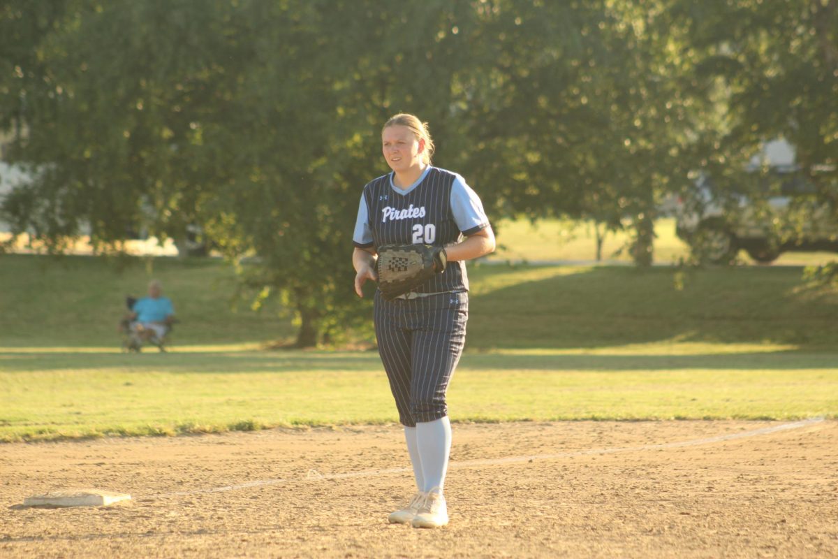 Daecia Lane waits for the opposing team to bat.