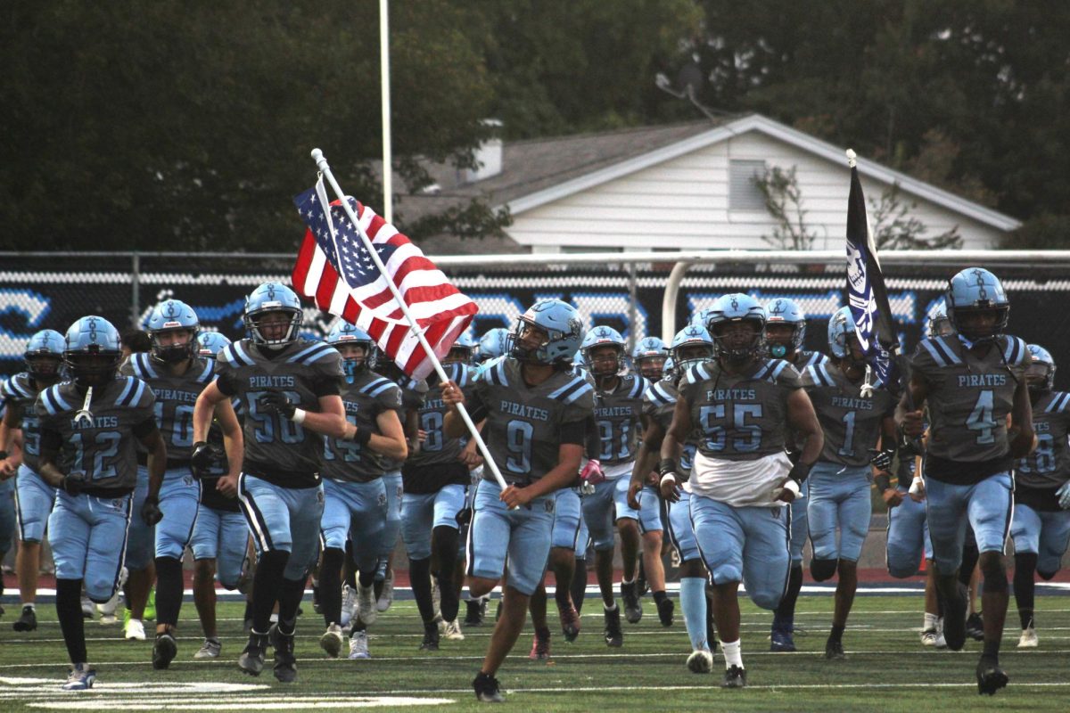 Ezequiel Lopez leading the team out for their Thursday game versus Holt