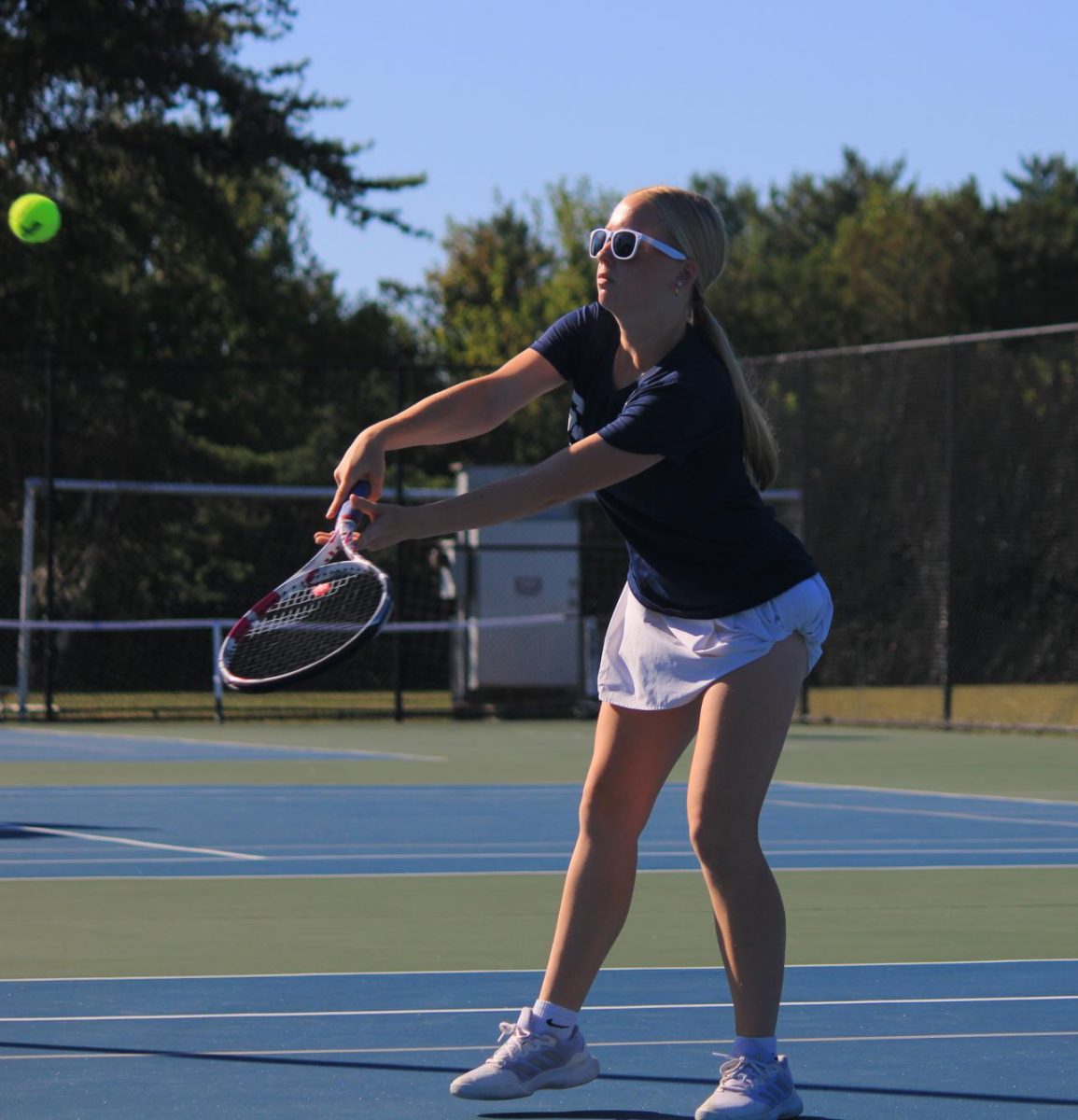 Airianna Ward prepares to hit the ball.