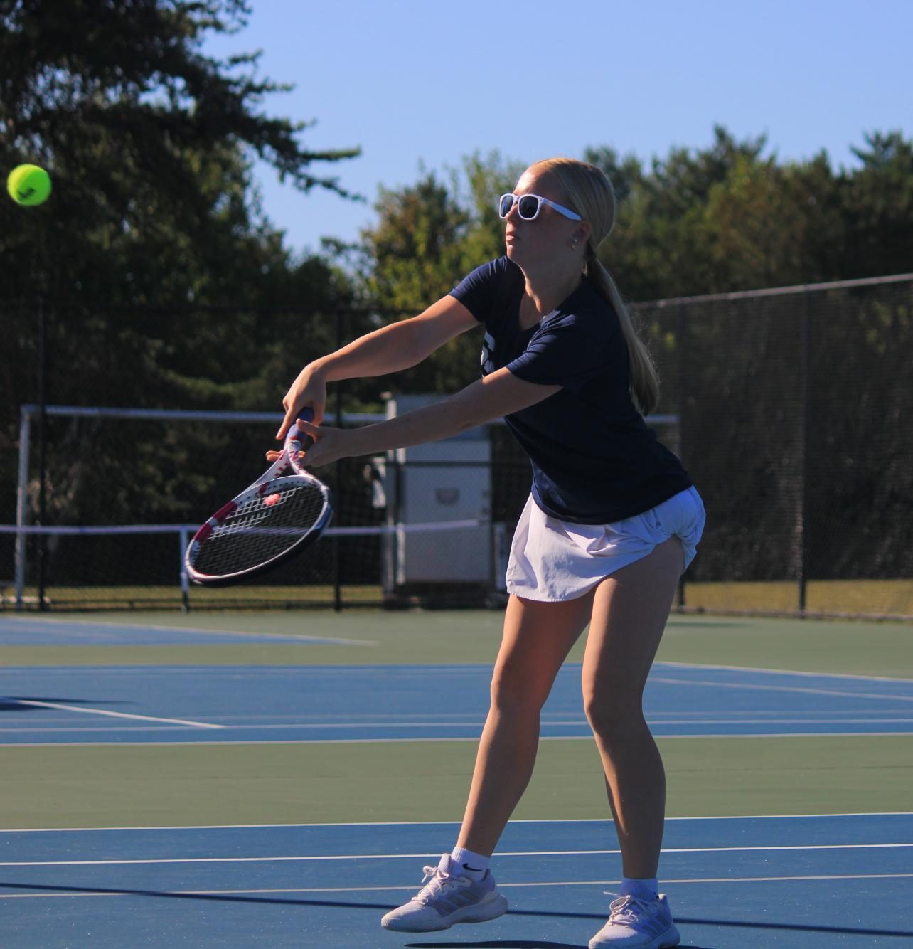 Airianna Ward prepares to hit the ball.