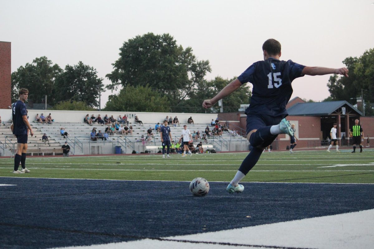 Lucas Skeen gets ready to kick the ball across the field.