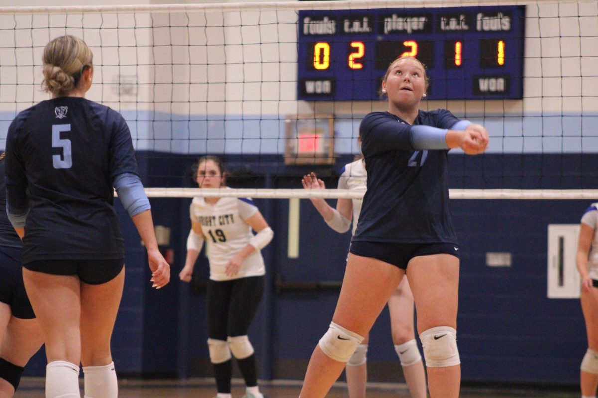 Brynn Genenbacher bumping the ball up in the game against Wright City