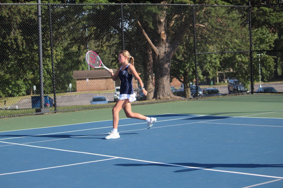Bailey Wetzler runs on the court.