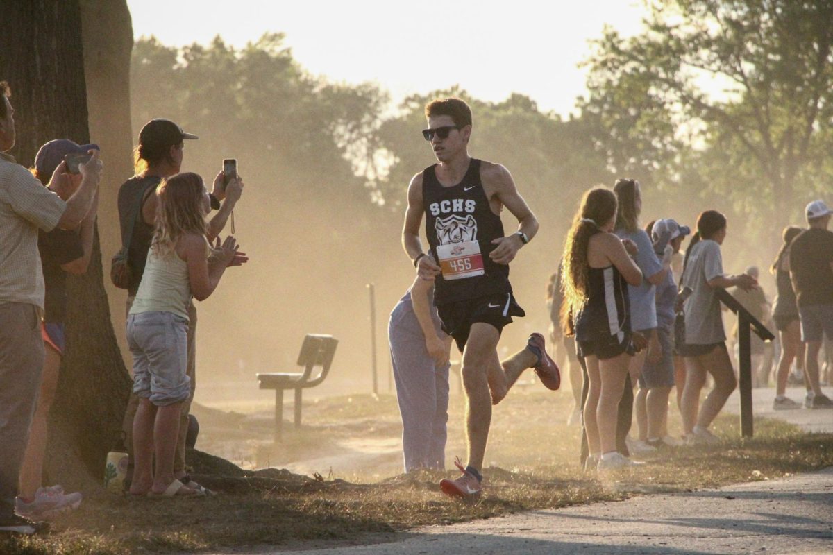 Elijah Case runs past the spectators.