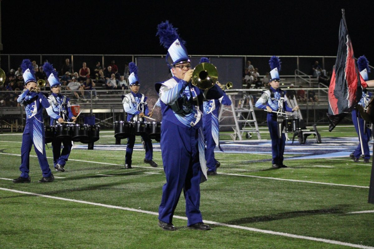 Band performs their halftime show, "Vengeance"
