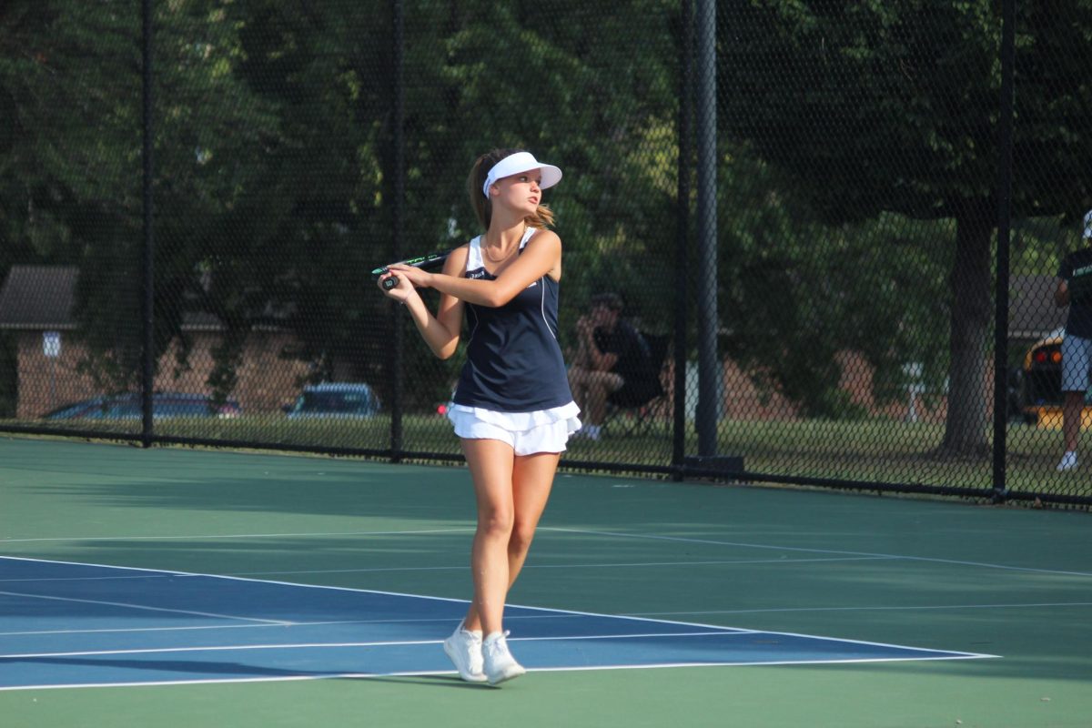 Auroria Brandmeyer playing tennis against Winfeild on 9/19