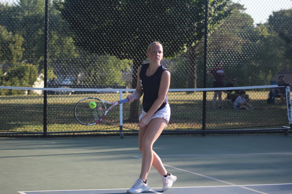Airianna Ward hits the ball back at her opponent.