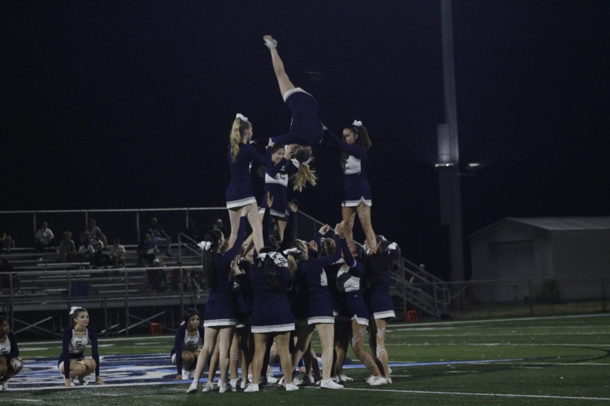 Gillian Phillips and the rest of Varsity Cheer on Sept. 18