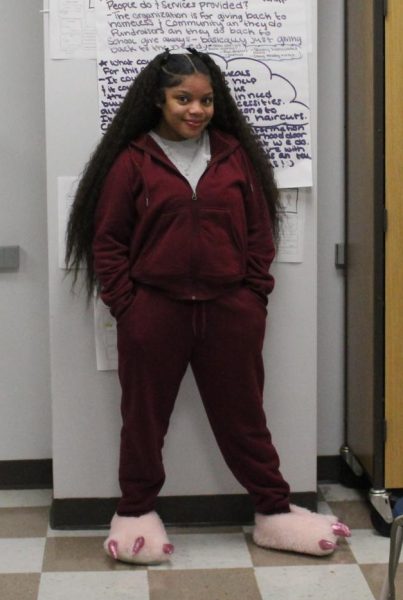 Student Kamiah Drones poses for an outfit picture.